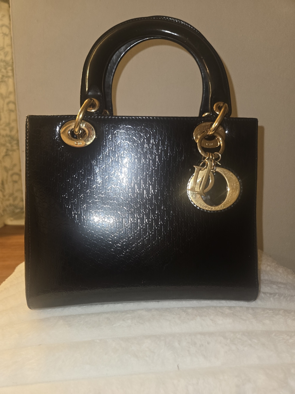 Black Structured Patent Leather Top-Handle Bag with Gold Hardware
